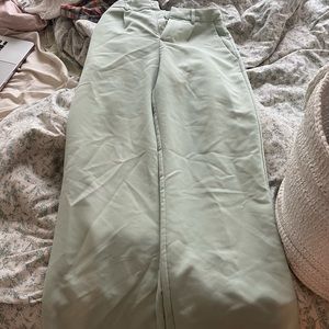 mint green trousers